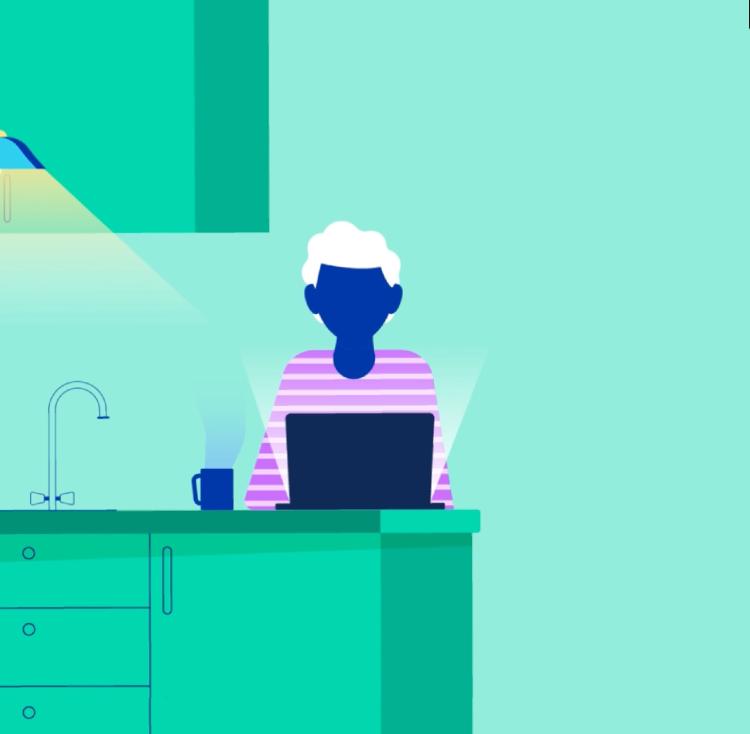 Nogen der sidder i køkkenet med en bærbar computer og ser på, hvordan man indsender et krav